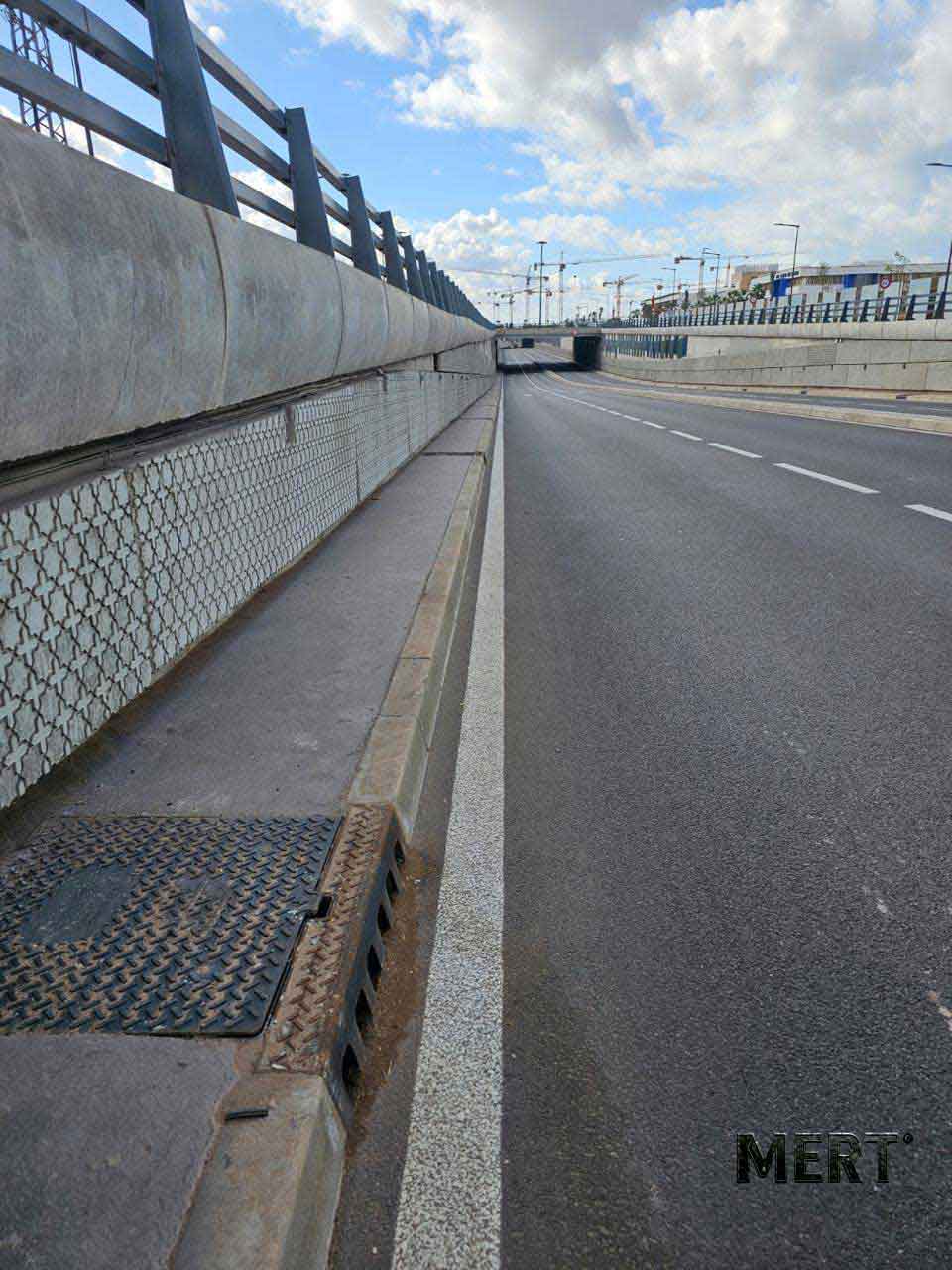 Kerb inlet positioned at the road edge inside a Casablanca underpass